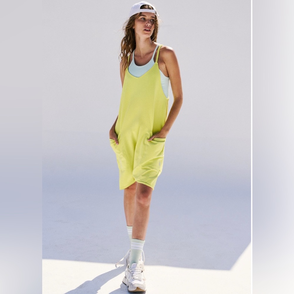 A NWT Free People Hot Shot Romper in Limeade, Size Large.